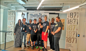 Team DWAI Stands with the BattleHack judges to receive their first place prize